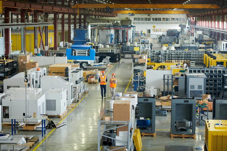 Workers in industrial warehouse